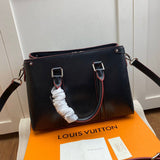 Handle and strap detail of structured statement women's handbag – women's designer-style accessory
