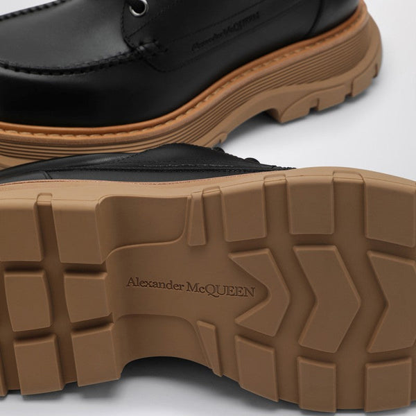 Close-up of Alexander McQueen flats hardware and fine stitching