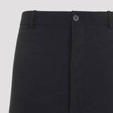 Close-up of Balenciaga pants hardware and fine stitching