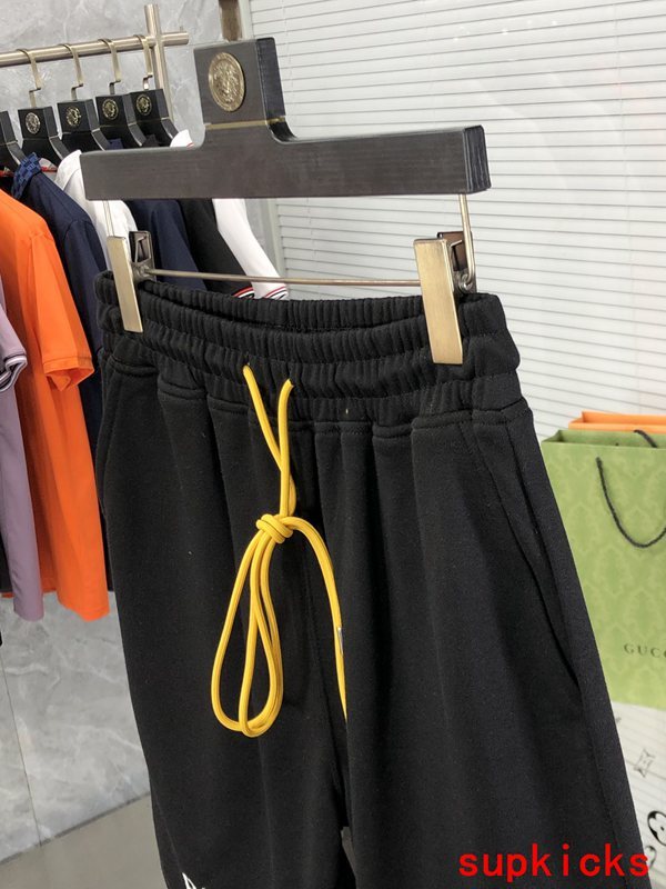 Front view of Rhude luxury clothing with label-forward styling