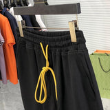 Front view of Rhude luxury clothing with label-forward styling