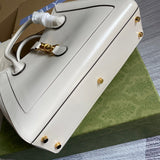 Handle and strap detail of structured statement women's handbag – women's statement bag