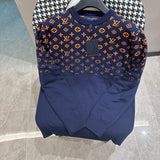 Back view of Louis Vuitton luxury clothing with label-forward styling