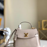 Front view of modern sleek women's handbag – women's statement bag