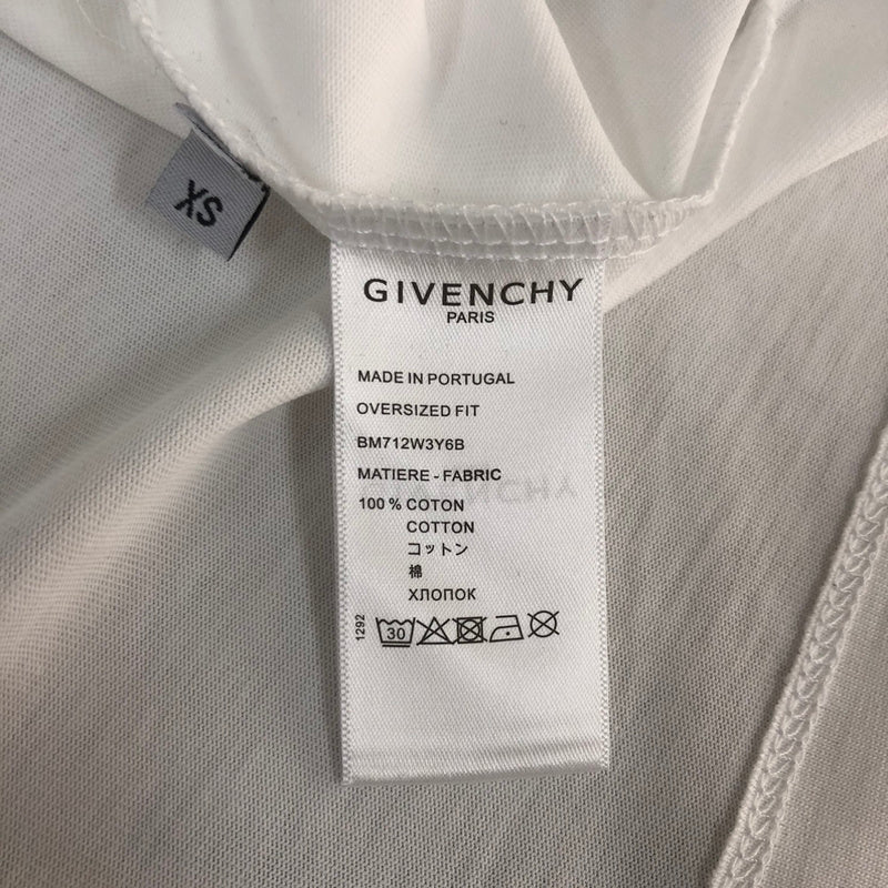 Side profile of Givenchy luxury clothing with tailored silhouette