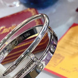 Angled view of Cartier unisex jewelry piece