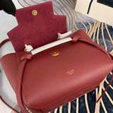Handle and strap detail of everyday-luxe classic women's handbag – women's statement bag