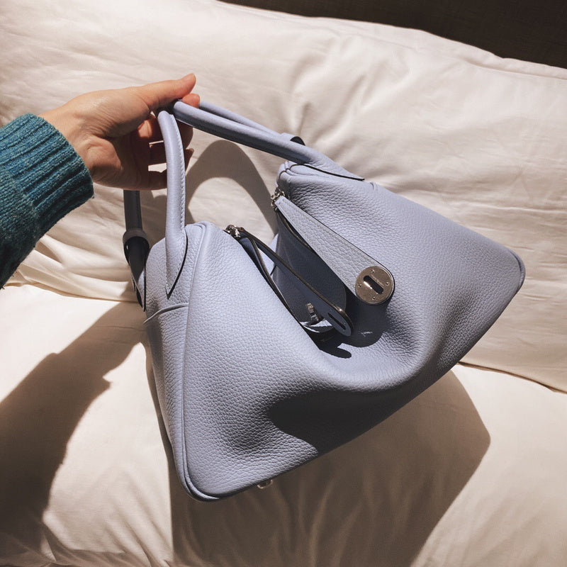 Side view of timeless structured handbag