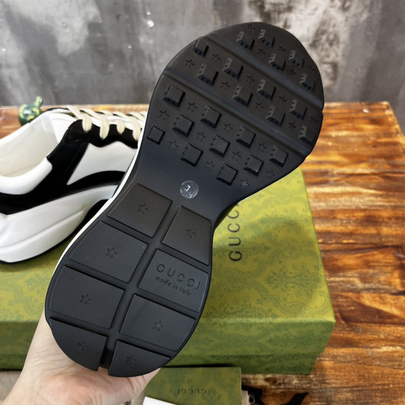 Side profile of Gucci clean off-white sneakers classic court silhouette