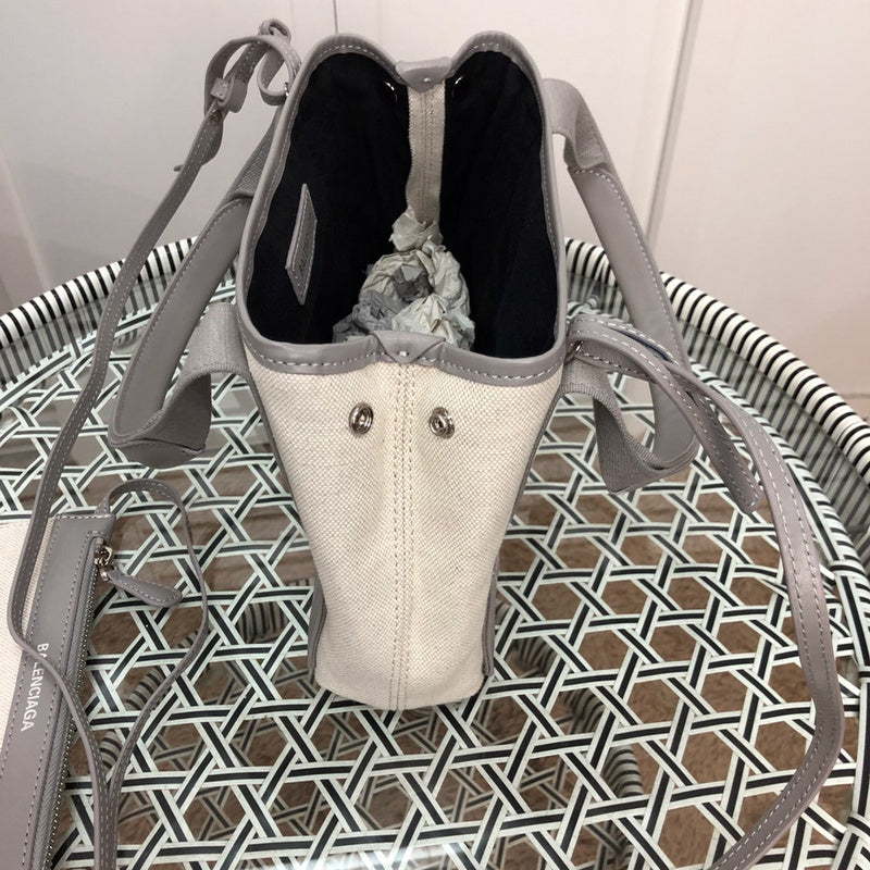 Close-up detail of signature polished women's handbag – women's luxury handbag