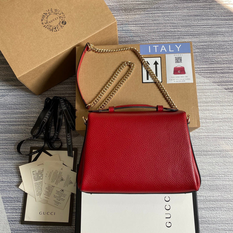 Front view of polished modern women's handbag – women's luxury accessory