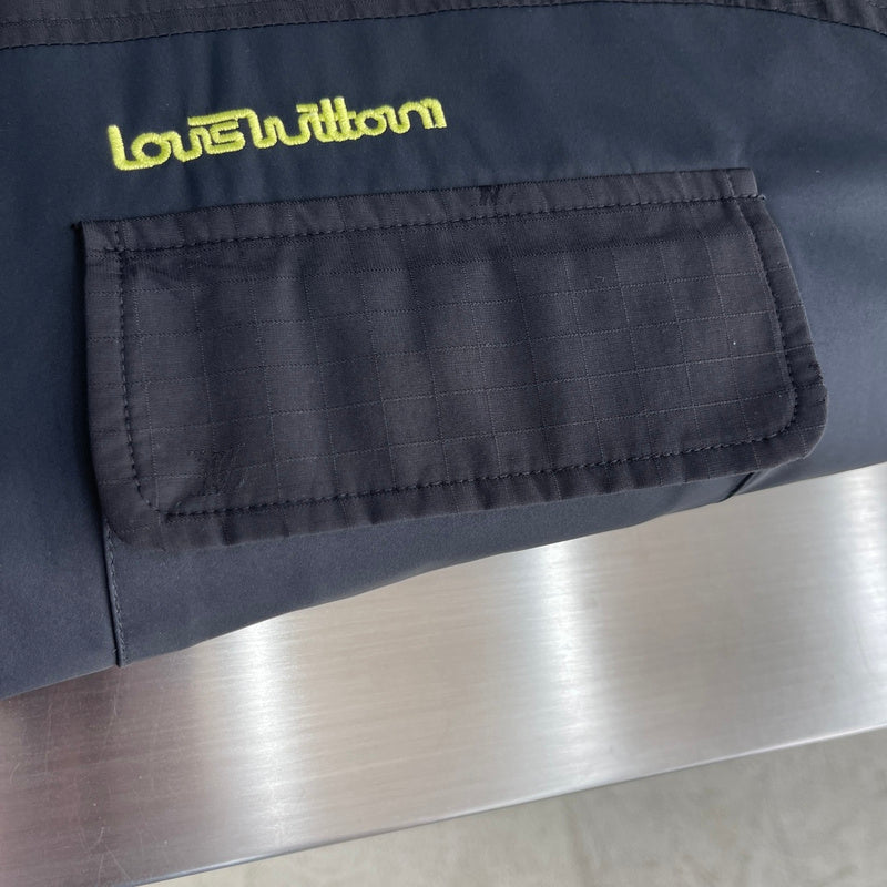 Flat lay presentation of Louis Vuitton luxury clothing with contemporary cut