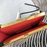 Front view of sleek chic women's handbag – women's luxury accessory