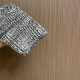Side profile of Louis Vuitton luxury clothing with logo-detail design
