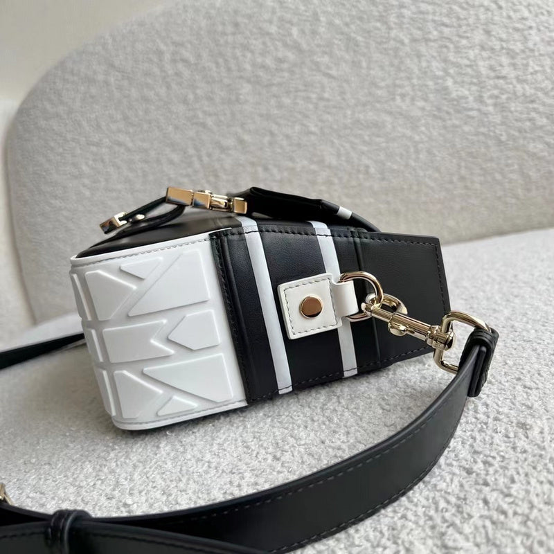 Styled lifestyle shot of sleek everyday-luxe women's handbag – women's designer-style accessory