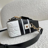 Styled lifestyle shot of sleek everyday-luxe women's handbag – women's designer-style accessory