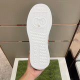 Side profile of Gucci muted earth tones sneakers retro runner design