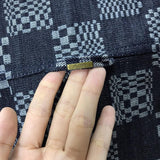 Side profile of Louis Vuitton luxury clothing with contemporary cut