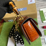 Styled lifestyle shot of sleek refined women's handbag – women's premium purse