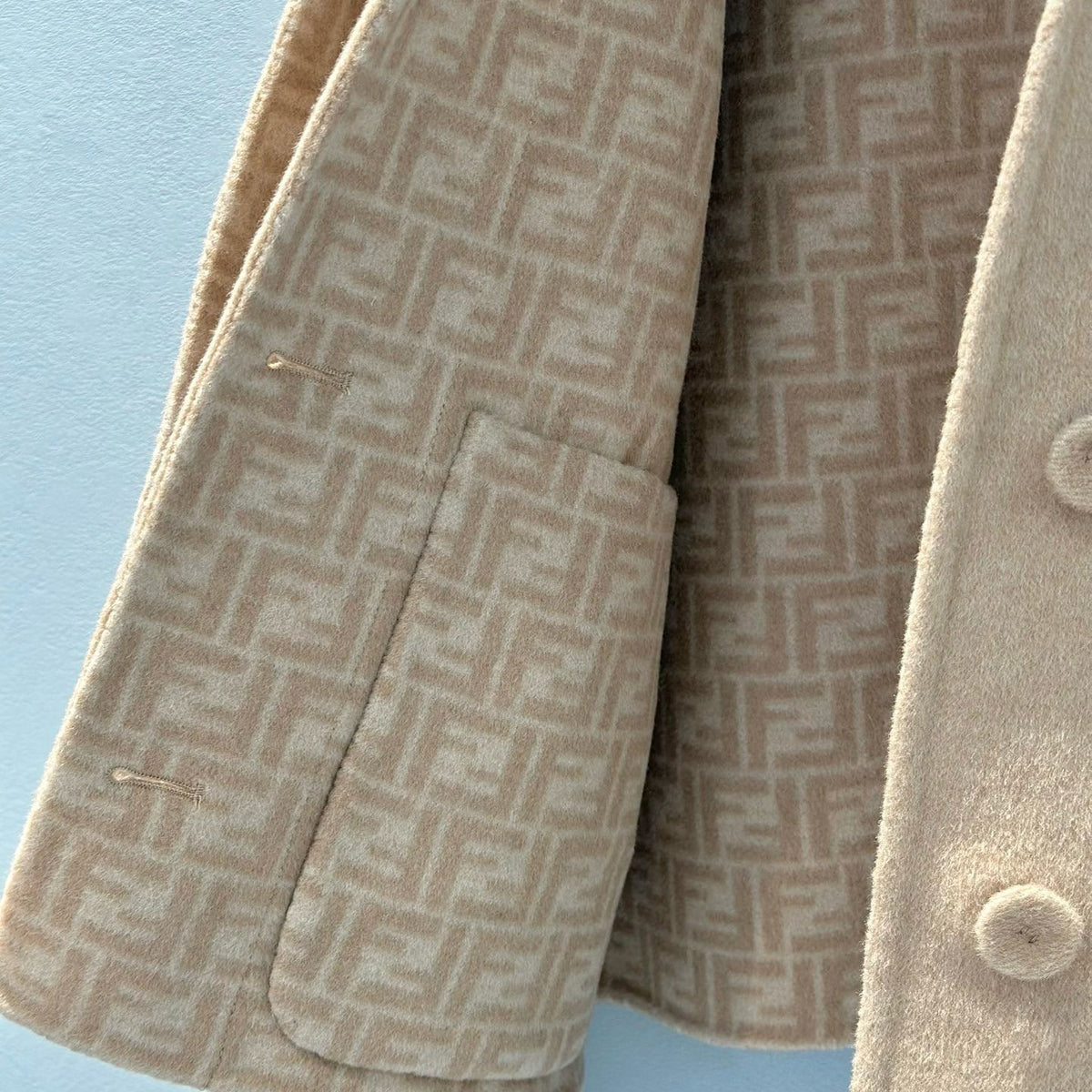 Detail shot of Fendi Coat premium leather texture