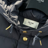Close-up of Celine Vest signature hardware and stitching detail