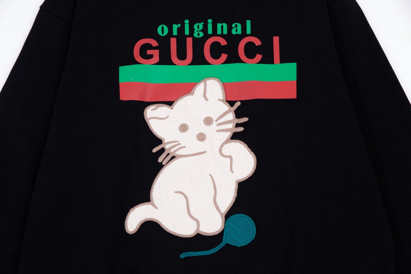 Flat lay presentation of Gucci luxury clothing with everyday silhouette