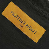 Close-up detail shot of Louis Vuitton cotton t-shirt with logo-detail design