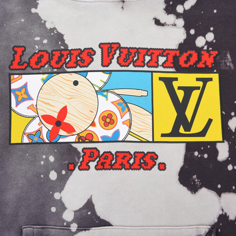 Close-up detail shot of Louis Vuitton luxury clothing with everyday silhouette