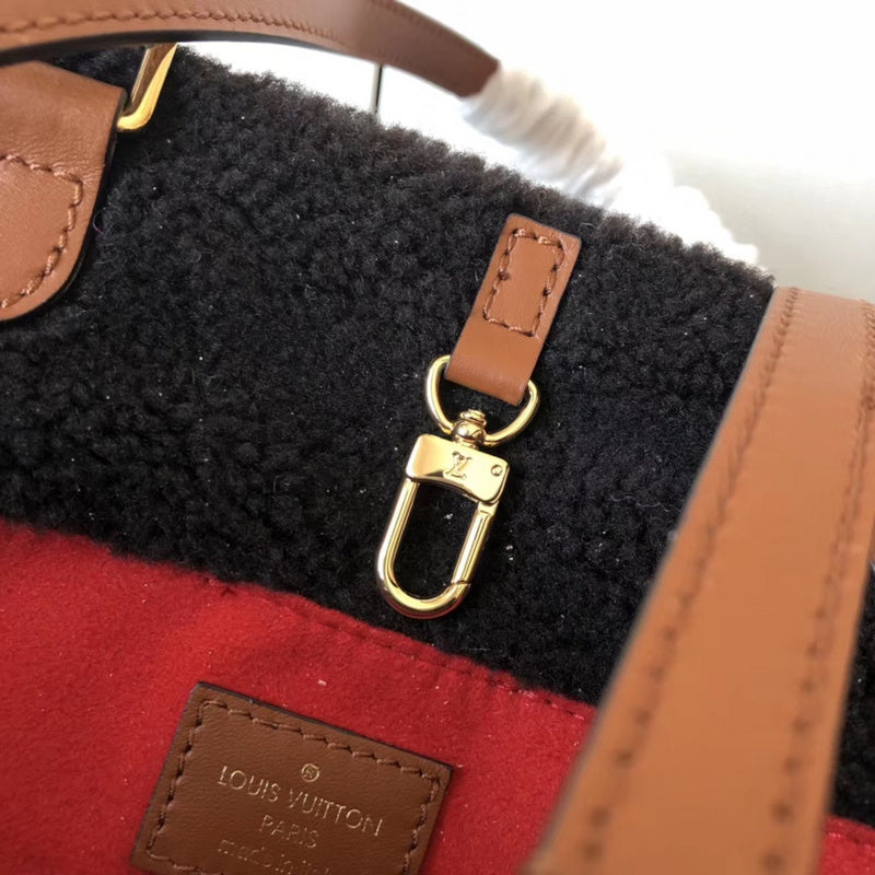 Front view of classic sleek women's handbag – women's everyday handbag
