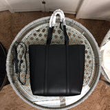 Front view of chic everyday-luxe women's handbag – women's designer-style accessory