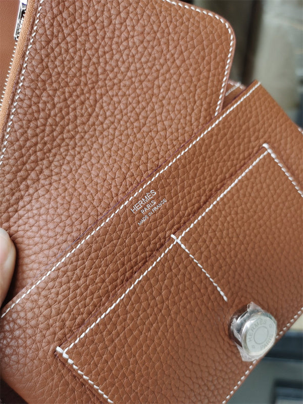  Signature shoulder bag carried on shoulder