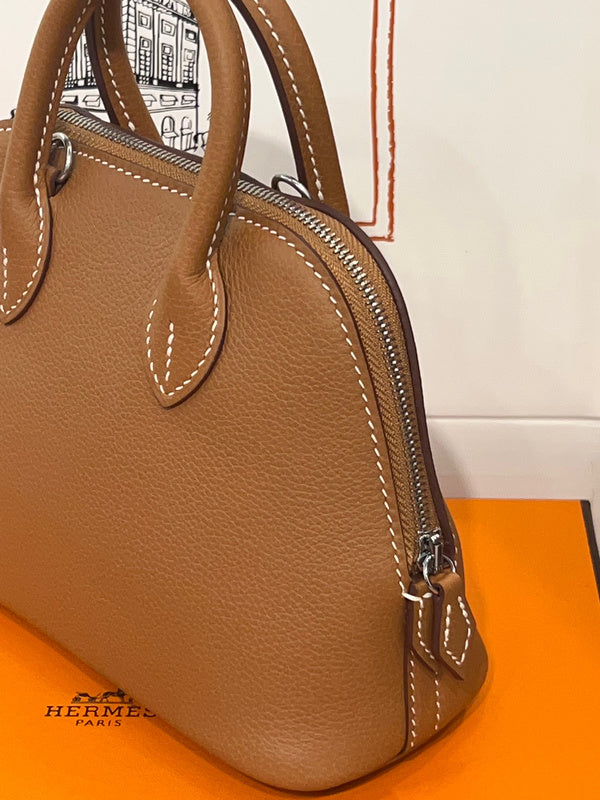 Side view of minimalist structured handbag