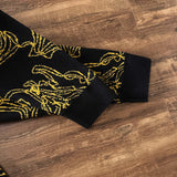 Flat lay presentation of Louis Vuitton luxury clothing with logo-detail design