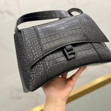 Ziva's Charm handbag – side angle view (one versatile size)