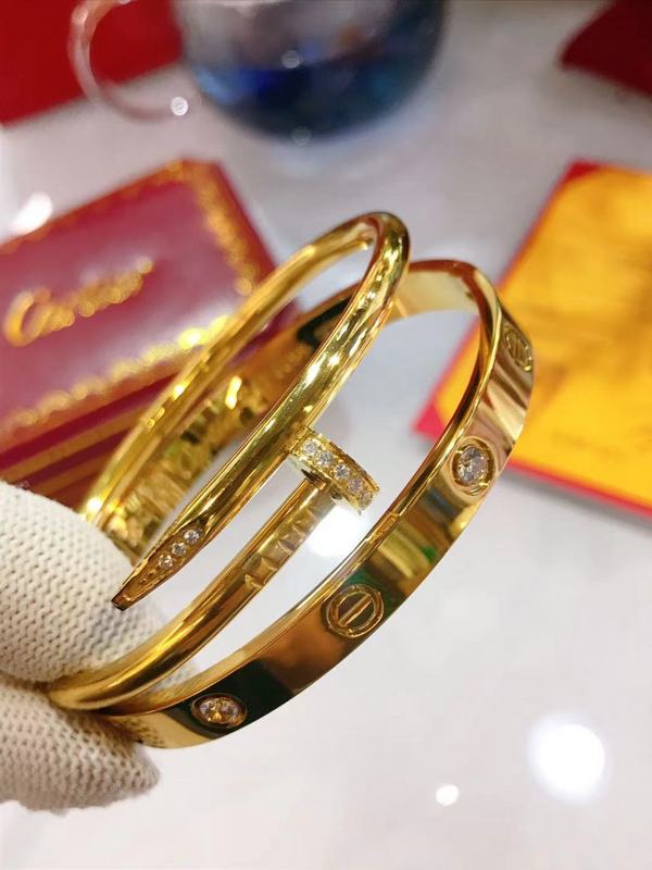 Close-up detail view of Cartier unisex jewelry piece
