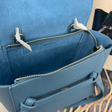 Handle and strap detail of classic refined women's handbag – women's designer-style accessory