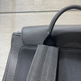 Handle and strap detail of sleek refined women's handbag – women's designer-style accessory