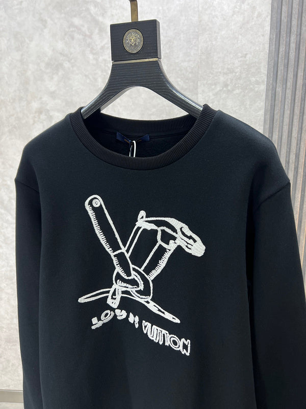 Front view of Louis Vuitton luxury clothing with label-forward styling