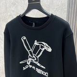 Front view of Louis Vuitton luxury clothing with label-forward styling
