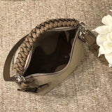Handle and strap detail of statement premium women's handbag – women's luxury accessory