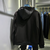 Flat lay presentation of Louis Vuitton luxury clothing with contemporary cut