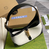 Handle and strap detail of signature elevated women's handbag – women's everyday handbag