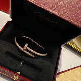 Close-up detail view of Cartier unisex jewelry piece