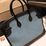  Sophisticated crossbody bag carried on shoulder