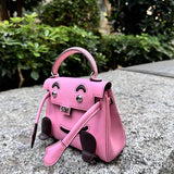 Side view of timeless structured handbag