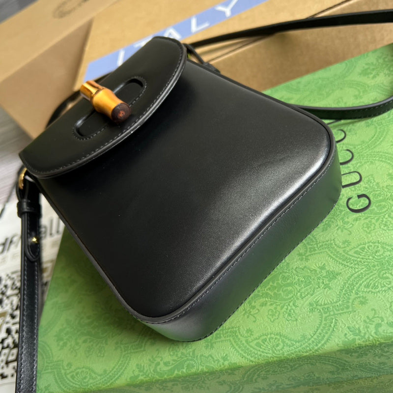 Side profile of sleek signature women's handbag – women's luxury accessory