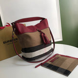 Ziva's Charm handbag – side angle view (one versatile size)