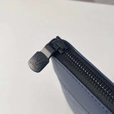 Top view of refined classic women's handbag – women's designer-style accessory