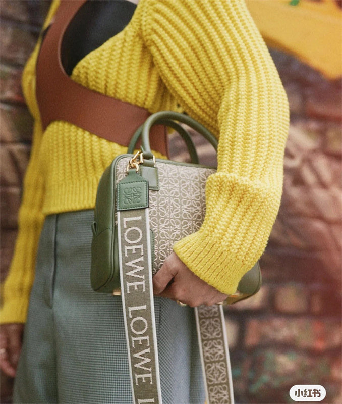  Tailored satchel carried on shoulder 22