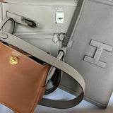 Side view of modern structured handbag
